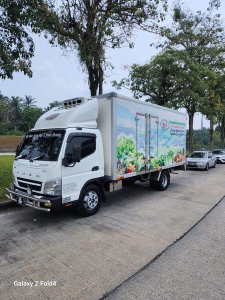 Hot Shine delivery truck on the road